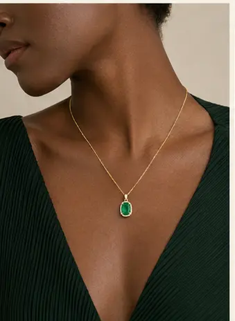 Celeste Emerald Pendant styled on a model from a second angle