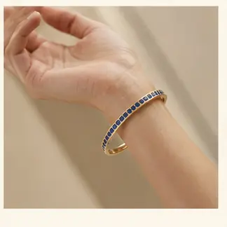 Nocturne Sapphire Bangle styled on a model from a second angle