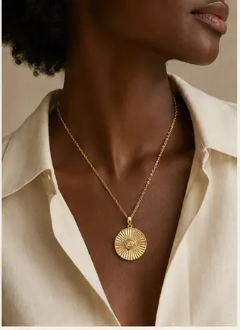 Solis Sunburst Medallion styled on a model from a second angle